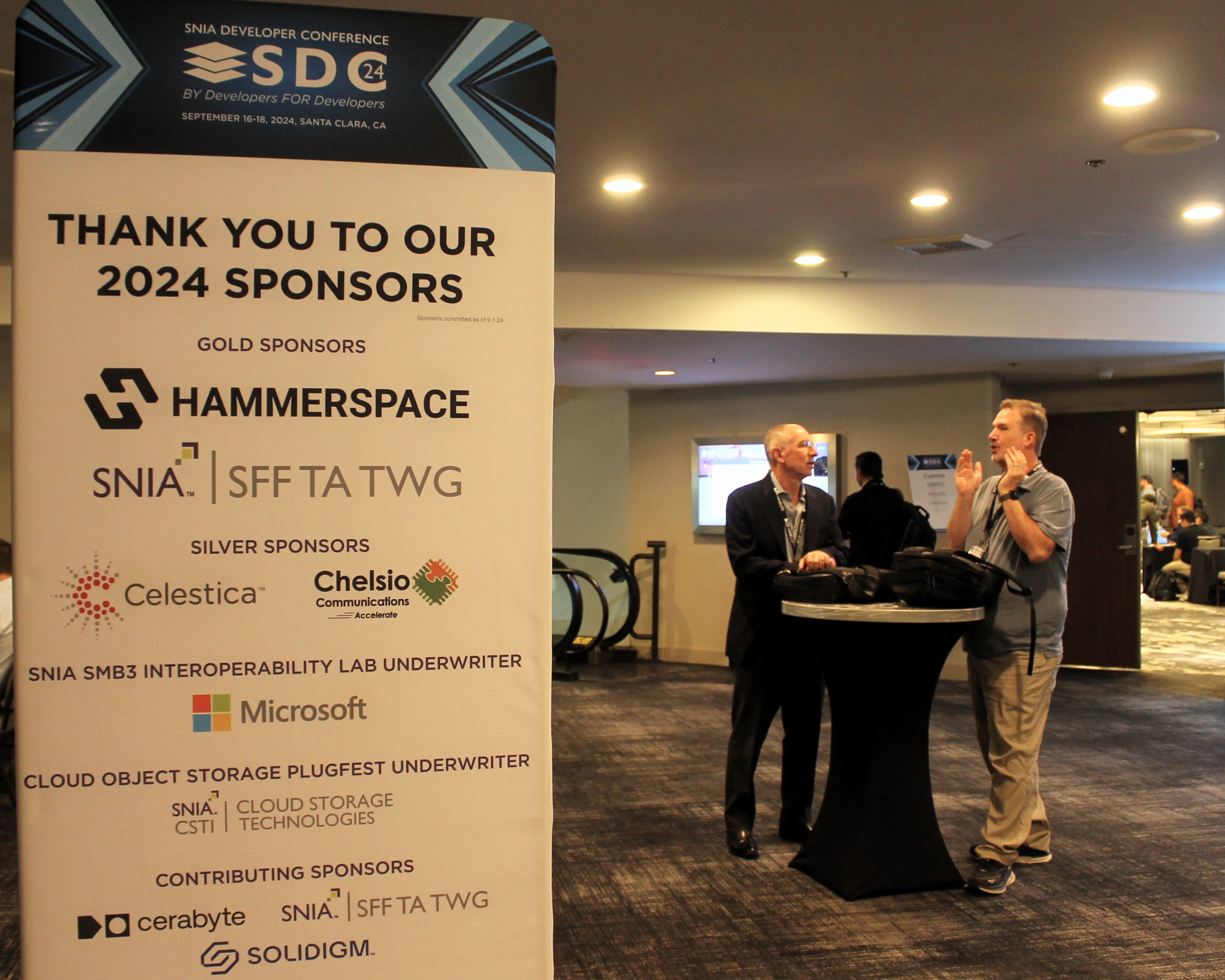 SNIA Developer Conference 2024 sponsor banner in the event hall